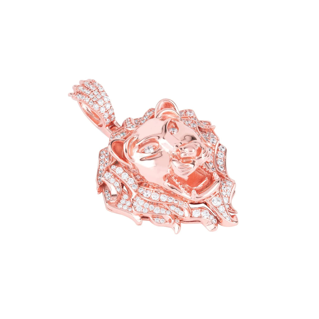 The Touch 925 Majestic Roar Zircon Studded Rose Gold Locket. The locket features detailed facial features and a flowing mane, with a zircon-studded bail for attaching to a chain or necklace. This exquisite piece rivals any silver locket in elegance, with CZ stones enhancing its luxurious appeal.