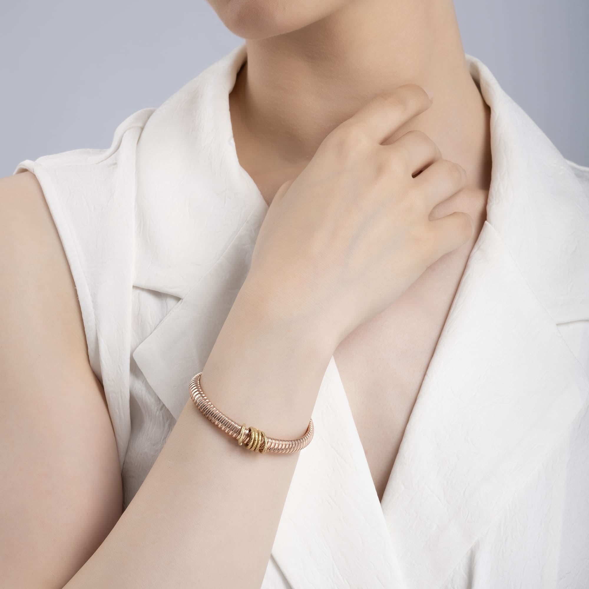 Twisted Rose Gold Charm Bracelet